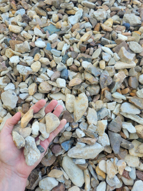 Close up photo of Native River Rock in the palm of a hand