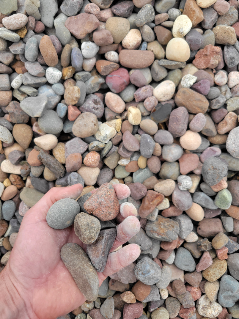 close up photo of multi colored river rock called Eau Claire located in Kansas City