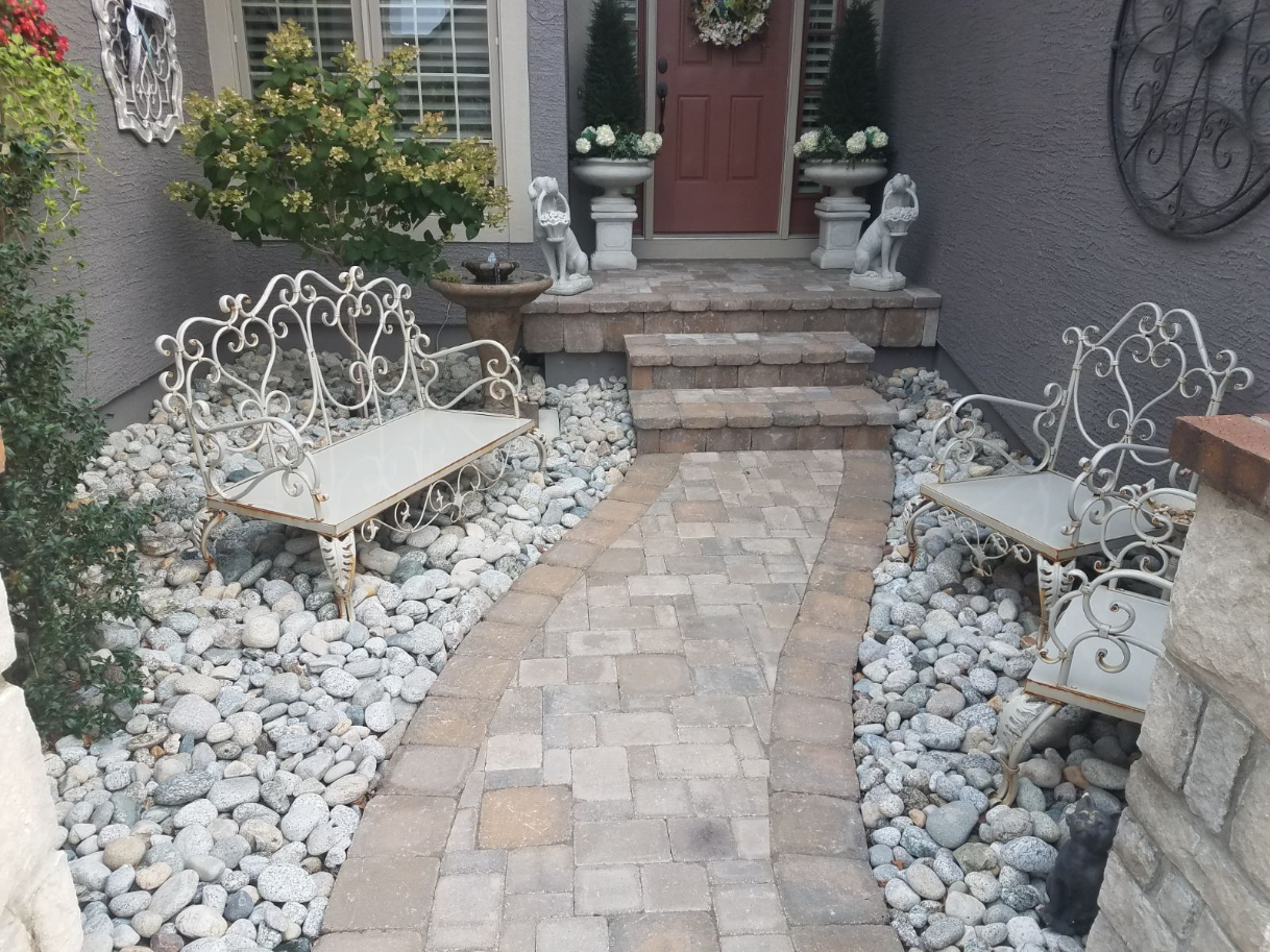 Gray Cobblestone on either side of a sidewalk in a front entryway located in Kansas City