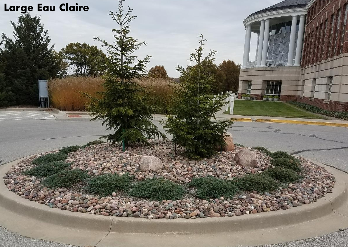 Eau Claire river rock in a landscape bed located in Kansas City