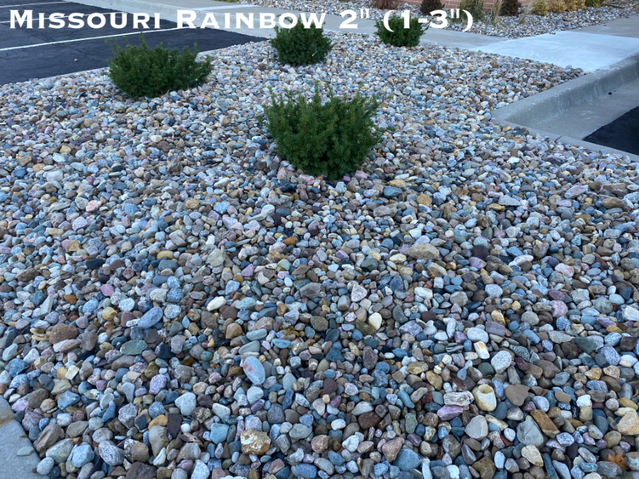 Missouri Rainbow River Rock used in a landscape bed located in Kansas City