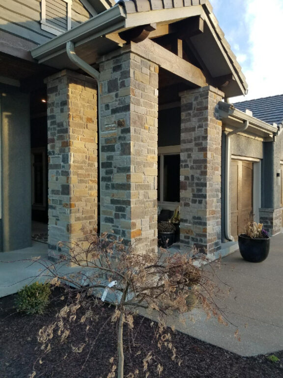 Burgundy Gray stone column entryway